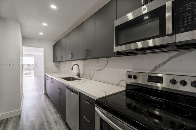 Building Photo - 3660 NE 166th St Unit 710