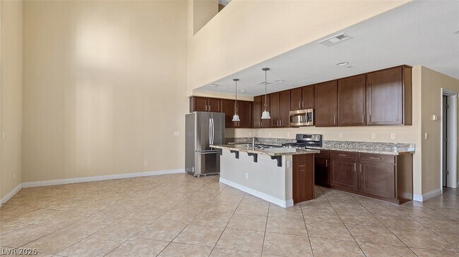 Photo - 7565 Norman Rockwell Ln Unidad 202
