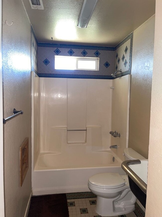 Photo - Move-In Ready 3-Bedroom Home with Backyard Living