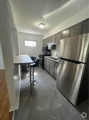 Building Photo - 119 W Swain St Unit Upper East Rental