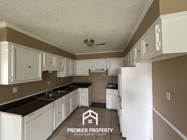 Photo - Beautiful 3BR/2BA Near Southwind | 1,681 Sq Ft, Vaulted Ceilings, Hardwood Floors & Garage