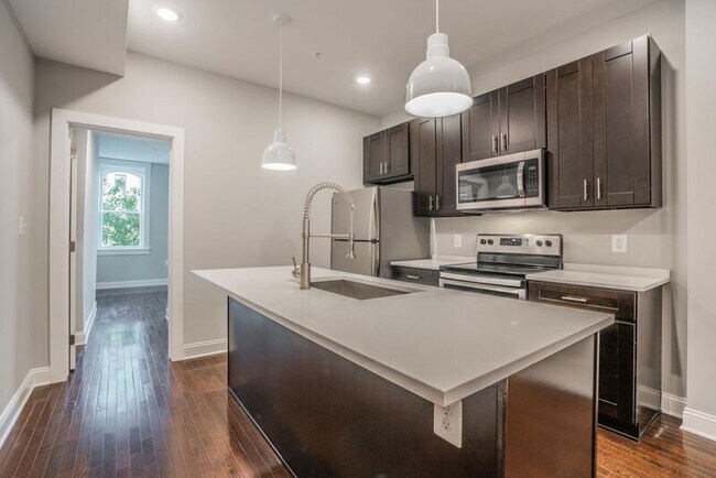 Building Photo - 310 E Lanvale St Unit 3