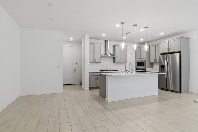 Photo - Experience refined living in this beautifully appointed 3-bedroom, 2.5-bathroom townhome spanning...