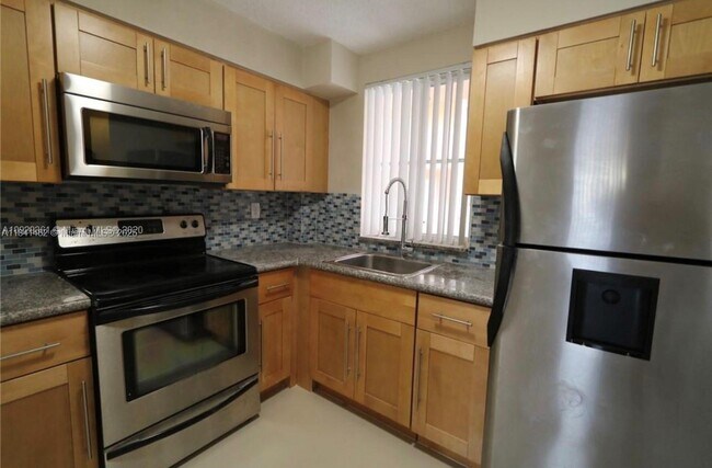 Building Photo - 6045 NW 186th St Rental