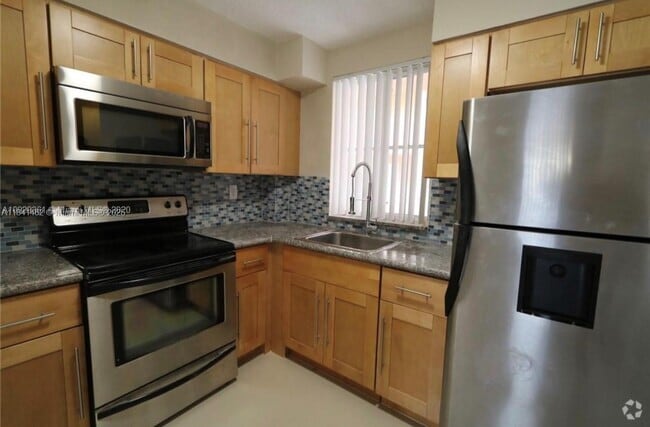 Building Photo - 6045 NW 186th St Rental