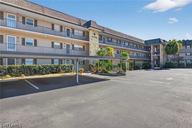 Building Photo - 4912 Tamiami Trl E Unit A-308