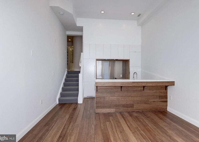 steps up to the Den off of the Kitchen / Living Space - 4600 Kenmore Dr NW Unit Private Apartment
