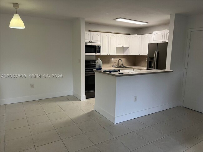 Building Photo - 4800 NW 102nd Ave Unit 103-10