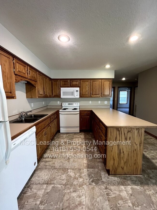 Photo - RANCH STYLE DUPLEX AVAILABLE NOW - SELF-TOUR!