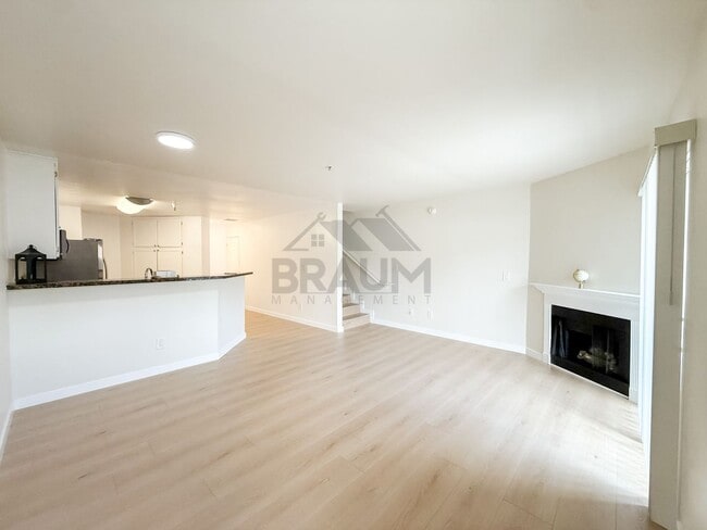 Building Photo - 7323 Winnetka Ave Unit 105