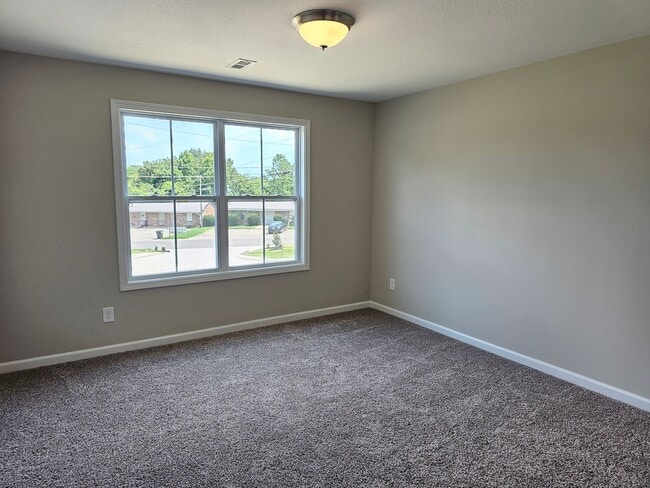 Photo - Built in 2024! Close to downtown 2 Bed/2.5 Bath. Nice private backyard with trees