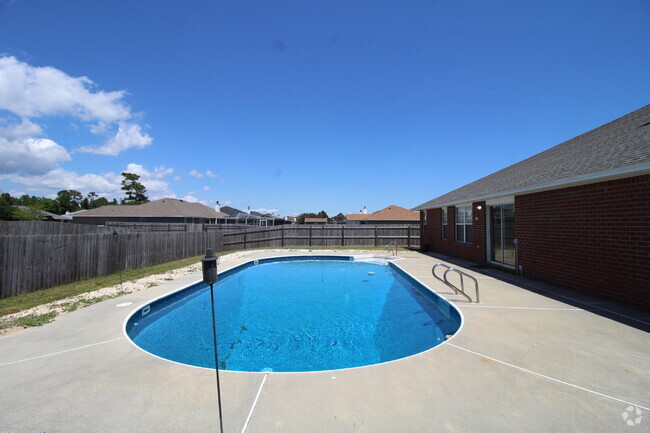 Building Photo - Spacious 4-Bedroom Home with Pool Care Inc...