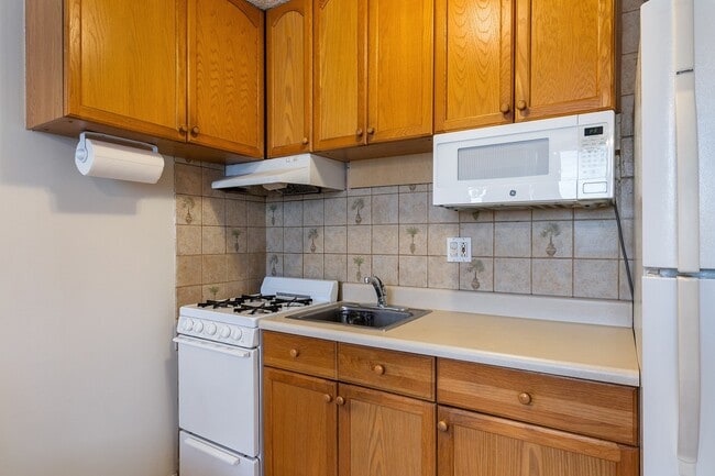 Photo - Furnished 1 Bed 1 Bath Condo. Includes Electric, Water, Sewer & Gas. Ample unassigned parking. Unit 205