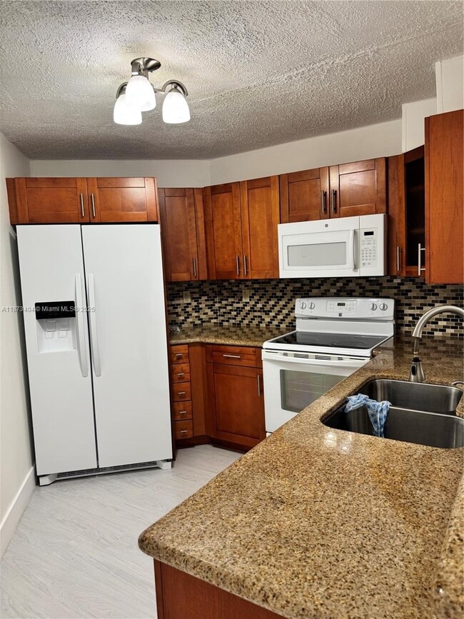 Building Photo - 9427 Fontainebleau Blvd Unit 203-34 Rental