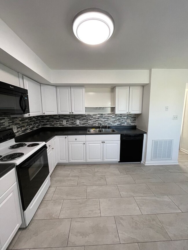 Photo - Centrally Located 3BR Townhome – Close to Everything!