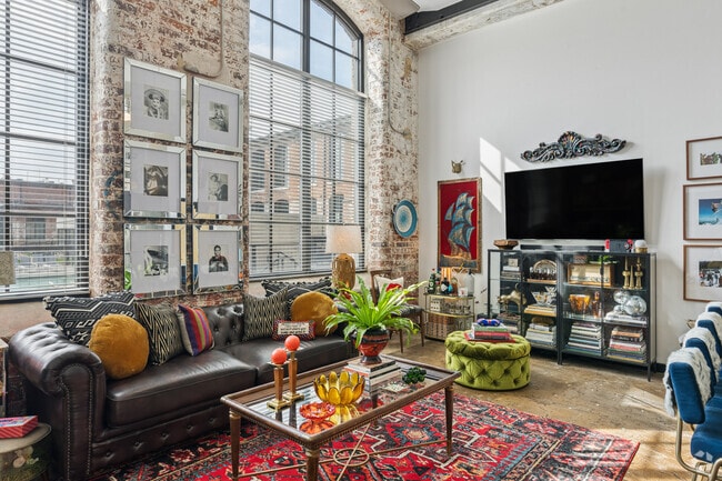 1BR, 1BA - 671SF - Living Room - The Lofts at Hawthorne Mill
