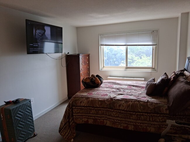 Dormitorio principal con baño en suite - 7333 New Hampshire Ave Unidad 11th Floor