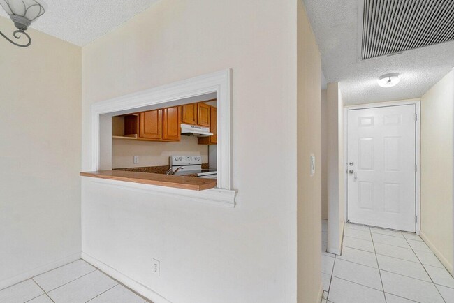 Photo - 6736 Palmetto Cir S Unit 105