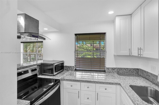 Photo - 4211 NW 19th St Unit LIKE NEW CONDO