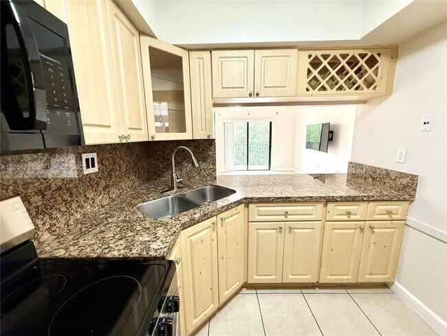 Photo - 5765 W 25th Ct Unit 402