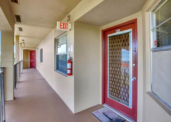 Building Photo - 1151 SW 128th Terrace Unit 402D