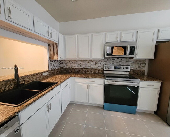 Photo - 8273 SW 27th St Townhome