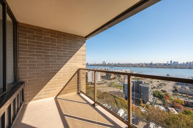 Building Photo - 9060 Palisade Ave Unit 1005