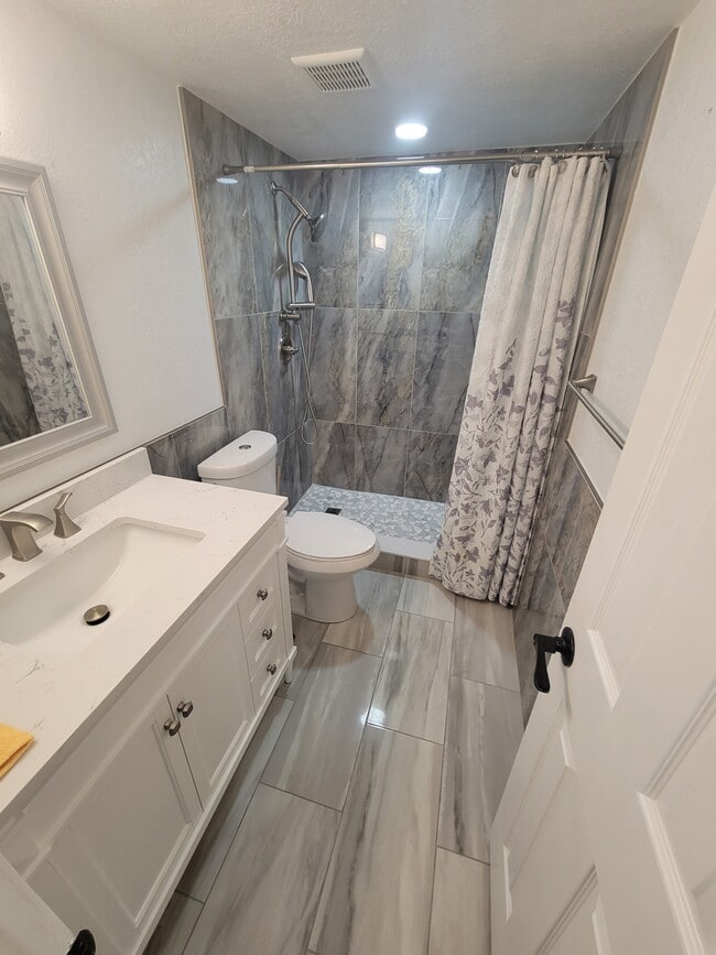 Photo - 1335 85th Ter N Unit A