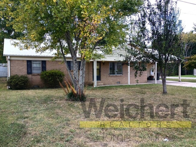 Building Photo - Updated 4-Bed Home with Fenced Yard & Carport