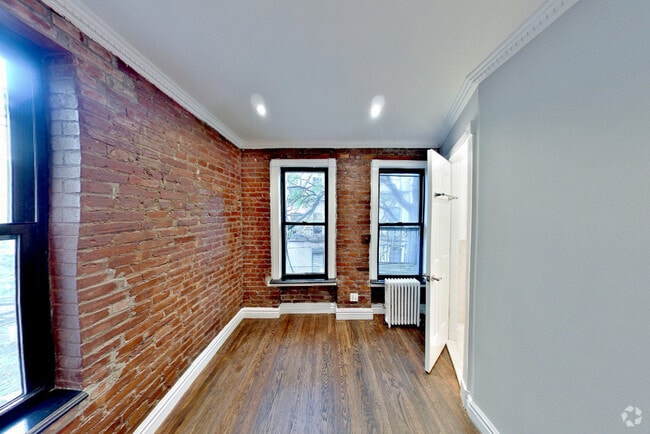 Building Photo - 416 E 13th St Unit 2E Rental