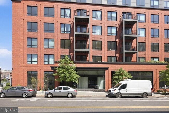 Building Photo - 7175 12th St NW Unit 201