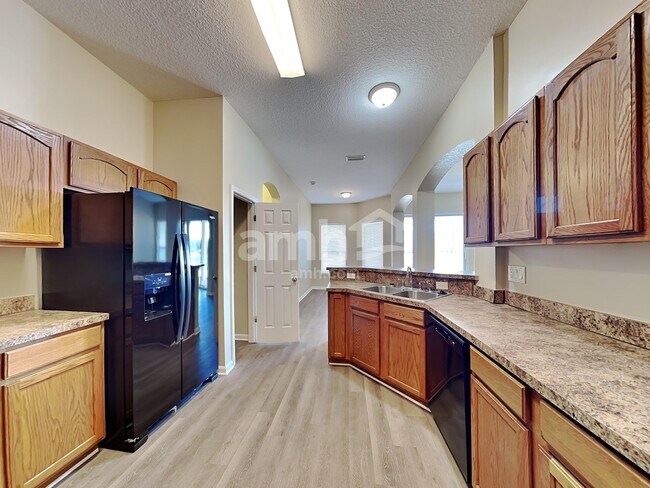 Photo - 7117 Rapid River Dr W