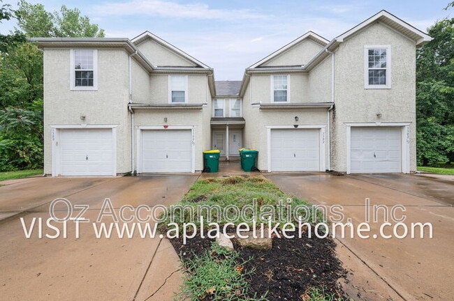 Building Photo - 3300H N 103rd Pl