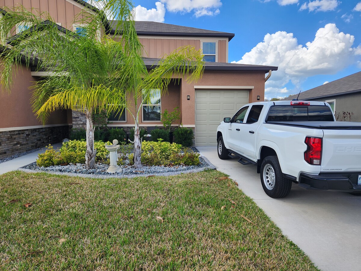 two front windows + 1-car garage & driveway. Front door is left of the windows - 9434 Channing Hill Dr Unit MIL Suite