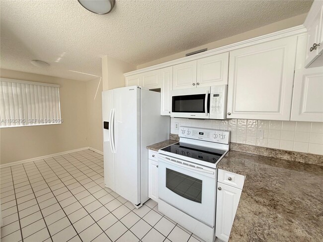 Photo - 10426 E Clairmont Cir Unit 212