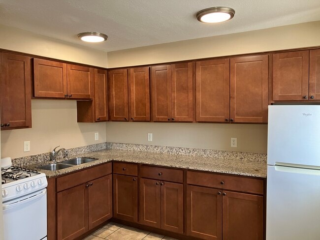 Building Photo - Campus Apartments 700-727 University SE