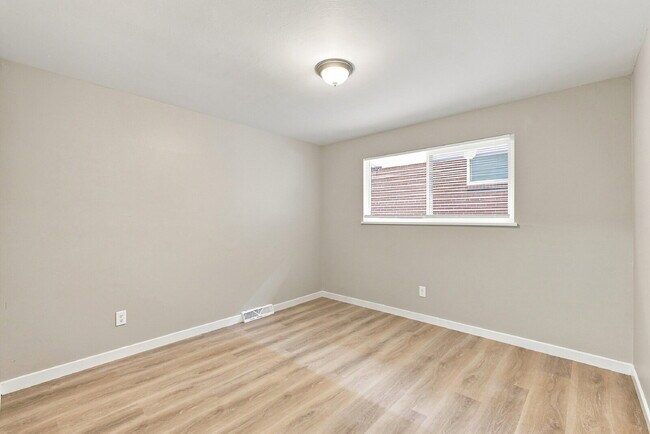 Photo - $2,115.95 with $300 Off the first month's rent, 4 Beds, 2 Baths, Triplex Unit in Littleton with W... Unit #5565