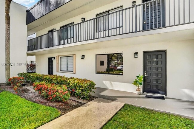 Building Photo - 9920 NW 68th Pl Unit 110