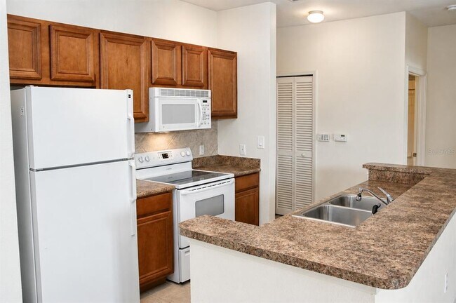 Photo - 8341 38th St Cir E Unidad 107