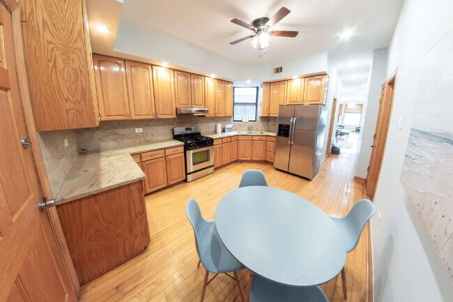 Photo - FURNISHED 3-Bedroom Apartment in Vibrant Chicago Neighborhood! Unit 2