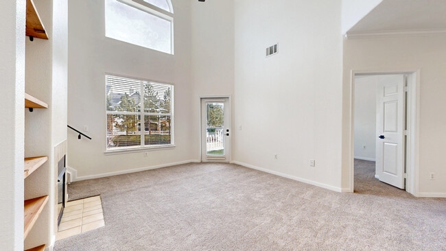 Living Room with Vaulted Ceiling - 6021 Castlegate Dr W Unit E25