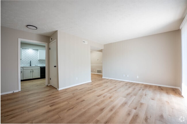 2 habitaciones, 2 baños, 950 pies cuadrados, sala de estar - The Eclipse Apartment Homes