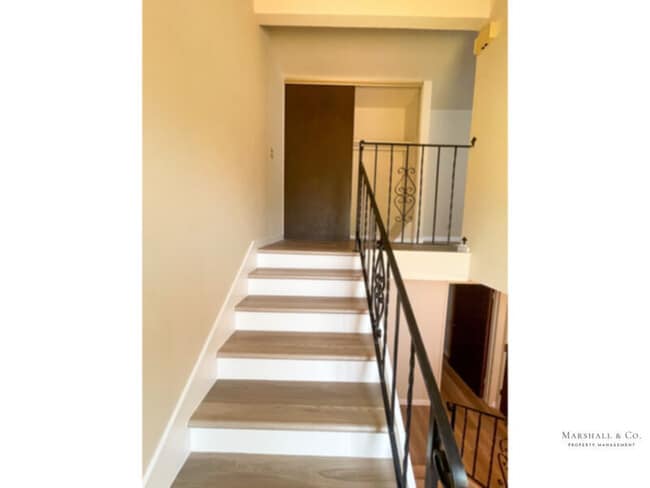 Photo - UPDATED AND BEAUTIFUL 2BR/1BA DUPLEX TOWNHOME, NEW WOOD FLOORING, PRIV. ENCLOSED BACK YARD, 2 CAR GA