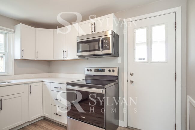 Photo - This home exudes a cheerful and welcoming charm!