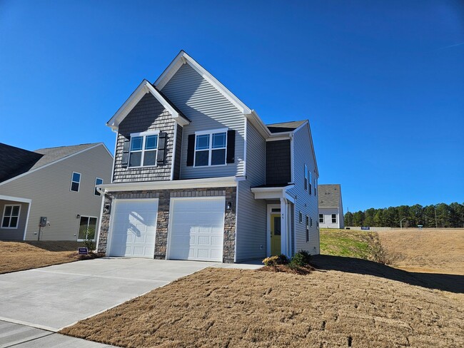 Building Photo - Wonderful Home! 4br 2.5Ba w/ 2 car garage!...