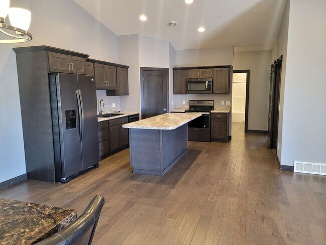 Photo - Three bedroom two bathroom triple garage house