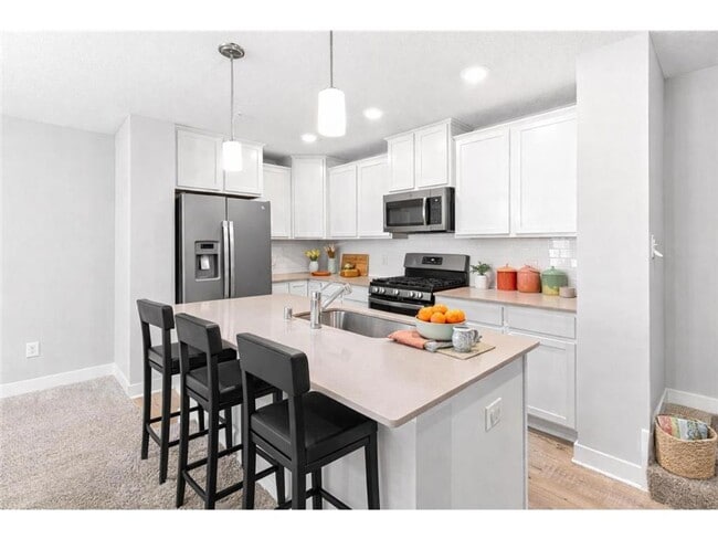 Photo - Spacious 3BR Townhome with Loft & Attached 2-Car Garage - Available NOW!