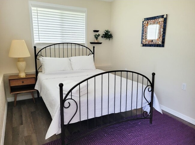 The bedroom features a queen bed, 32" smart tv and walk in closet - 5114 33rd St E