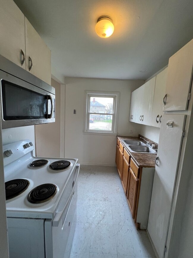 Building Photo - 1310-1312 E 25th Ave Unit 1310