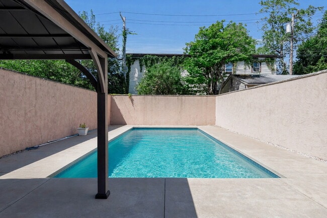 Photo - Furnished 4-Bedroom Home with a Private Pool near Elmwood Village